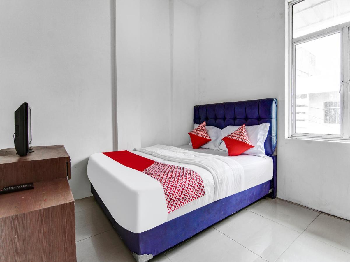 Oyo 90897 Hotel Sepupu Satria Пеканбару Екстериор снимка